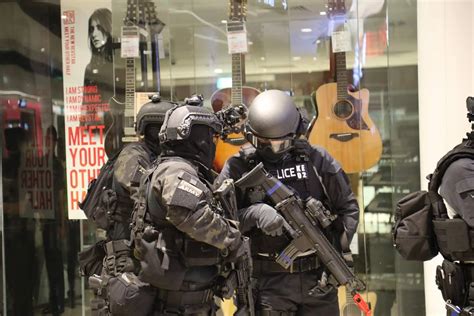 A Member From Singapore Army S Special Operations Task Force Coordinating With The Police S