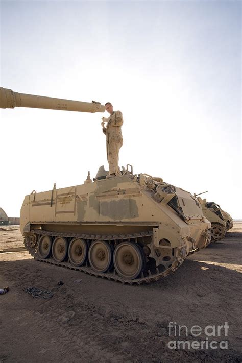 A Us Army Mechanic Uses A M113 Photograph By Terry Moore