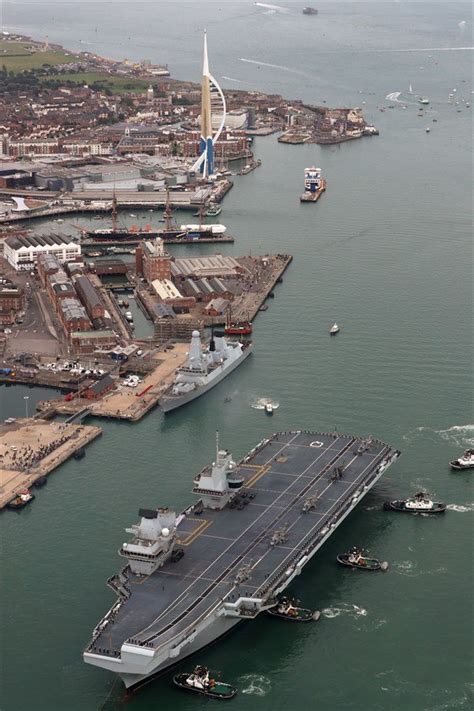 Hms Queen Elizabeth Royal Navy Flagship Docks In Portsmouth For The First Time Pictures