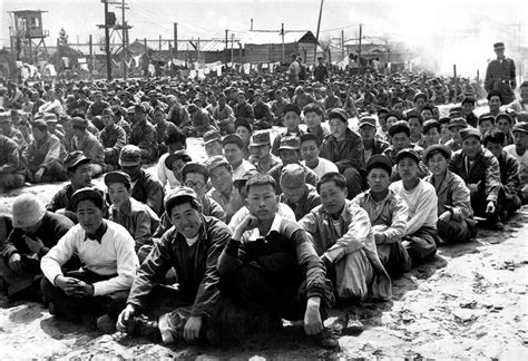 Horrors Of Korean War Revealed In Photos Showing Wounded Marines Waiting For Help And Child