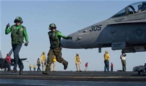 Petty Officers 3Rd Class Chord Deckert And Adam Fitzgerald Clear The Launching Area As An F A