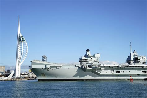 The Royal Navy Aircraft Carrier Hms Queen Elizabeth As It Arrives Back Into Portsmouth Harbour