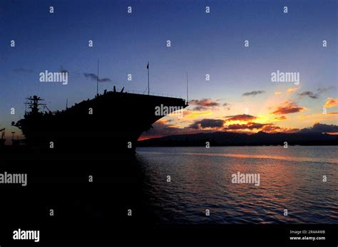 Us Navy The Sun Sets Behind The Nimitz Class Nuclear Powered Aircraft Carrier Uss John C